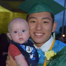Chan Hee at his graduation with baby Jack